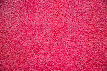 pink color painted wall concrete stucco surface texture