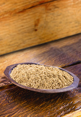 Sweet peanut ground and made in Brazil, called Paçoca, food on rustic wooden table, with space for text, Brazilian sweet. It is present in all the Juninas Festivals. 