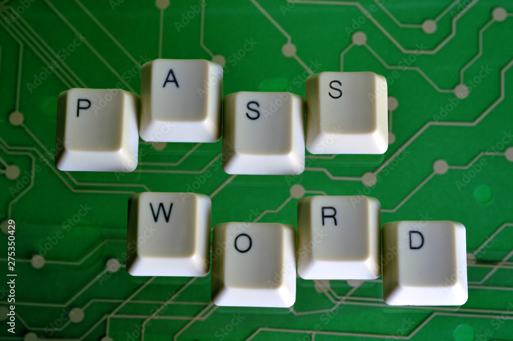 Poster keyboard keys form the word password on green electric circuit in the background.