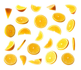 Set of flying cut fresh juicy orange on white background