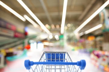 Blurred view of modern shopping mall interior