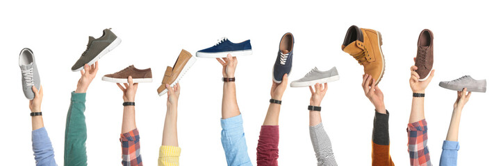 Set of people holding different stylish shoes on white background, closeup