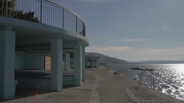 Bathing area. Terraces called Topolini that look out to sea along the coast in Trieste