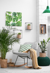 Stylish modern room interior with exotic houseplants