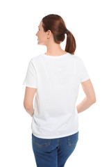 Fototapeta premium Young woman in t-shirt on white background. Mock up for design