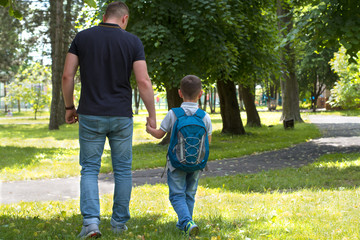 father walks with his son