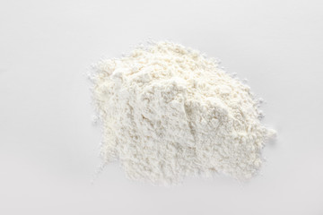 Pile of protein powder isolated on white, top view