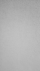 Textura o fondo de pared con pintura blanca con efecto gotelé granulado, rugoso, rasposo y áspero...