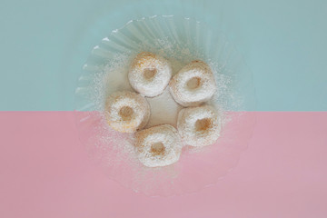 Mini Cakes isolated on a Blue and Pink Background