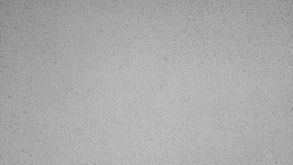 Textura o fondo de pared con pintura blanca con efecto gotelé granulado, rugoso, rasposo y áspero...