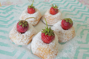 Mini Cakes with Strawberries isolated on a Colorful Background