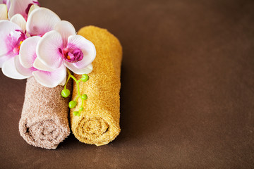 Chocolate Spa . Composition brown towel in hotel room of spa treatment