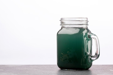 Green Spirulina Smoothie - Concept of food and drink, diet and nutrition - Text space