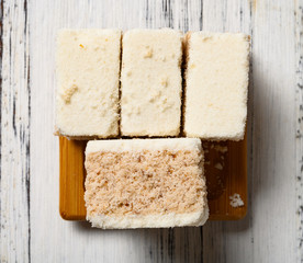top view traditional sweet scented osmanthus cake on a white table