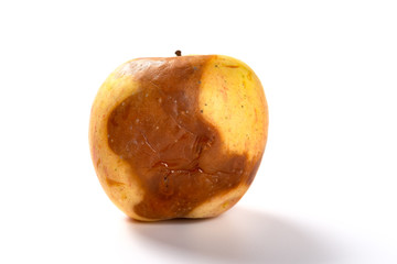 side view rotten apple on a white background