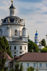 Maloyaroslavets, Russia - June 2019: View of the square with the monument to the war of 1812 and the Assumption Cathedral in Maloyaroslavets (Malojaroslavec, Maloyaroslavec)