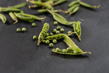 macro detail of fresh raw opened ripe of peas bean