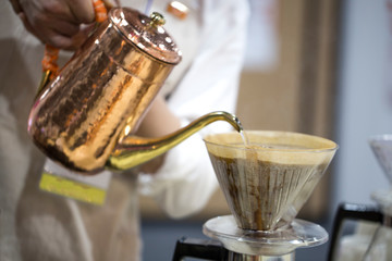 Hand drip coffee, Barista making drip coffee.