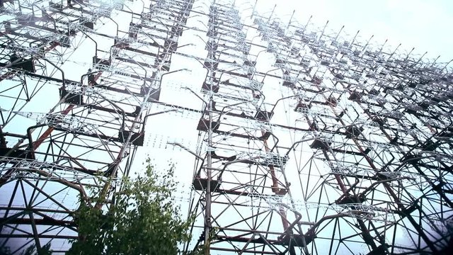 Amazing view of extremely large telecommunication radio center Duga or Steel Yard in Chernobyl, Ukraine. Standing below a huge electrical construction in exclusion apocalyptic zone.