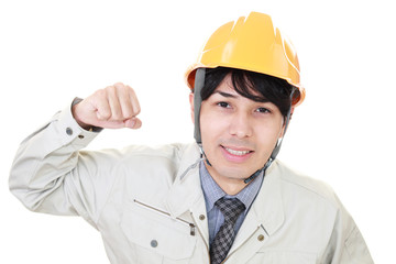 ガッツポーズの労働者