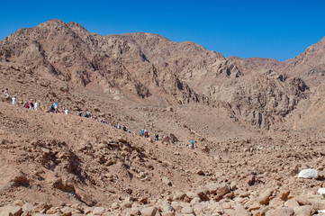 Tourists going to the desert trip in mountains near Blue Hole in Dahab, Egypt