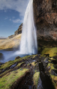 Beautiful scenery of Seljalandsfoss waterfall in Iceland. Seljalandsfoss is the famous natural landmark and tourist destination place of Iceland. Travel and natural Concept. © goodze