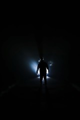 silhouette of a man with light backlight