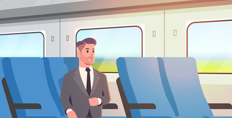 businessman traveling by train passenger man in suit sitting on comfortable chair during business trip travel long short distance public transport concept flat portrait horizontal