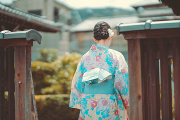 Woman dress up Japanese traditional Yukata on Kyoto street 