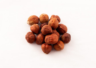 hazelnuts on white background