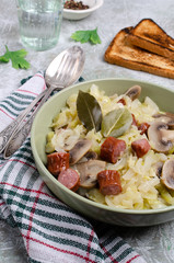 Stewed vegetables with sausages