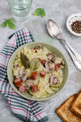 Stewed vegetables with sausages