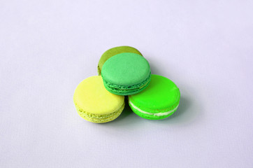 Dessert cake macaron or macaroon on trendy pastel lilac background