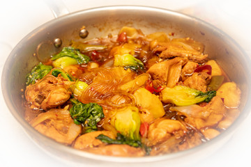 Spicy chicken stir-fry with sweet noodles.