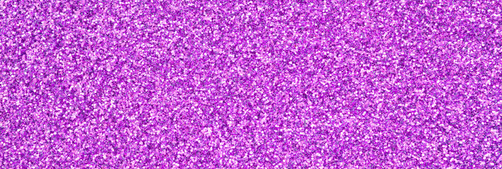 Purple decorative sequins. Background image with shiny bokeh lights from small elements