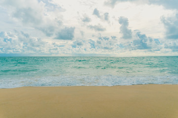 Tropical nature clean beach and white sand in summer with sun light blue sky and bokeh background.