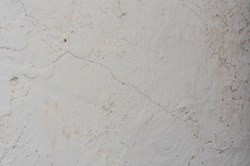 Texture, wall, concrete, it can be used as a background. Wall fragment with scratches and cracks