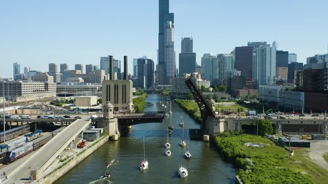 Zoom In as Boats Navigate the Chicago River during bi-weekly Bridge Raise