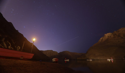 Car and Boat under the starry sky 