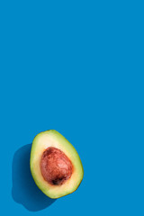 avacado on blue background