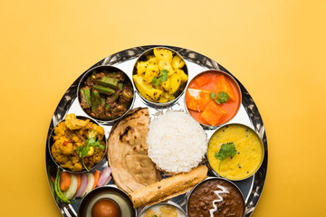 Indian Hindu Veg Thali / food platter, selective focus - obrazy, fototapety, plakaty
