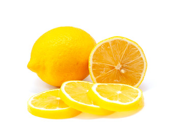 Whole and sliced pieces lemons isolated on white background.