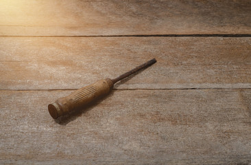 old handle chisel on wooden