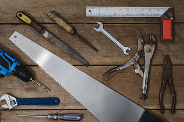 old instruments constructor or renovation for build and repair house on wooden background