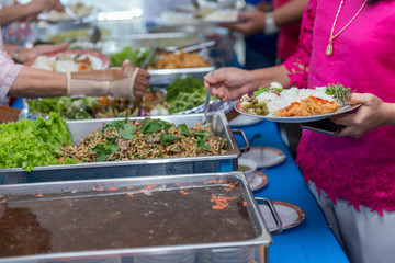 Food Buffet Catering Dining Eating Party Sharing Concept.people group catering buffet food indoor in luxury restaurant with meat colorful fruits and vegetables