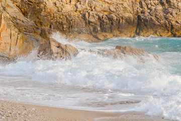 Storm in the sea, the waves beat on the rocks