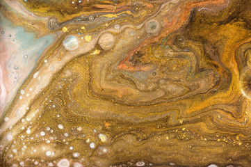 Bronze and gold marbling pattern. Golden marble liquid texture.