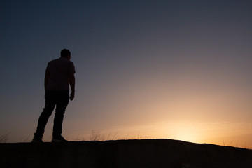 Obraz premium silhouette of man at sunset