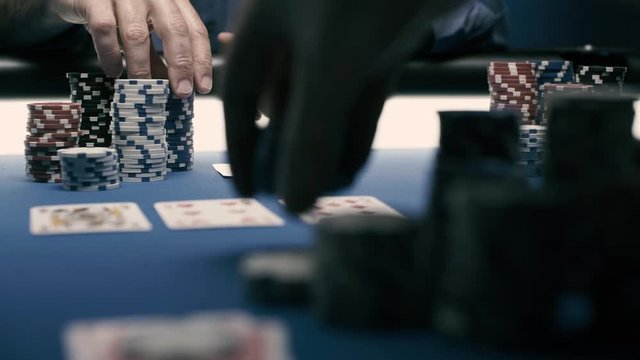 Successful poker player winning at the casino