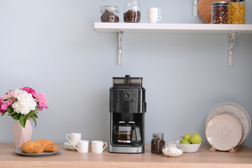 Modern coffee machine in kitchen